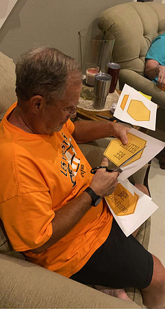 Grandpa cutting out "honeycombs" 3