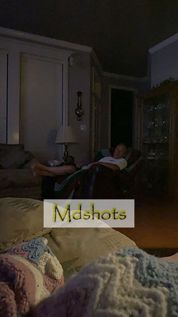 Samantha and Grandpa watching a movie